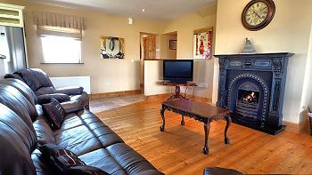 Comfortable leather suite & open fire place